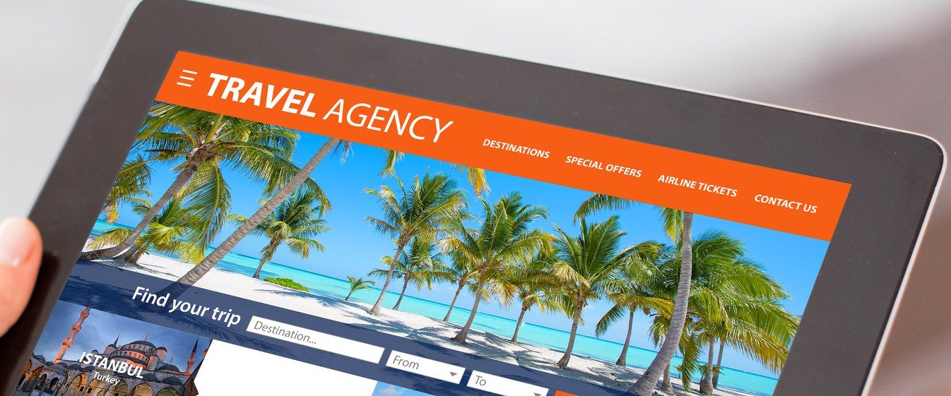 A travel booking website on a tablet screen
